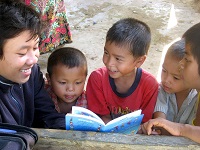 Kit, a first year student in Laos, reading aloud Big_Brother_Mouse